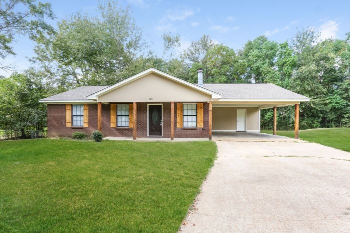 Primary Photo - Cozy Three Bedroom with Carport