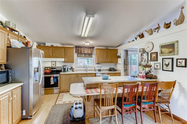 Photo - 9040 W 64th Pl House