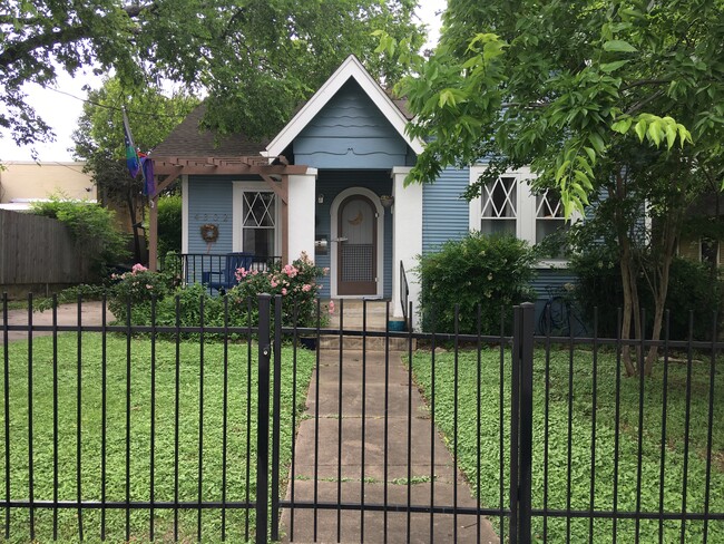 Charming front walkway and yard, mowing provided by landlords. - 4302 Duval Street