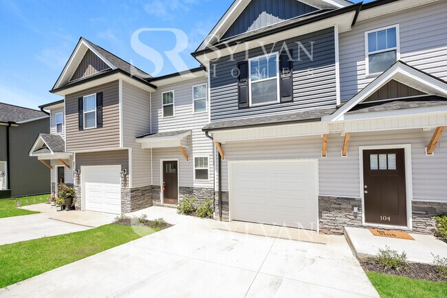Building Photo - Enjoy living the good life in this 3 bedroom, 2.5 bathroom townhome