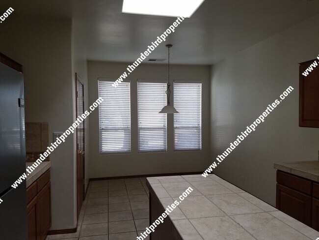 Building Photo - Beautiful and Spacious in NE Heights Gated...