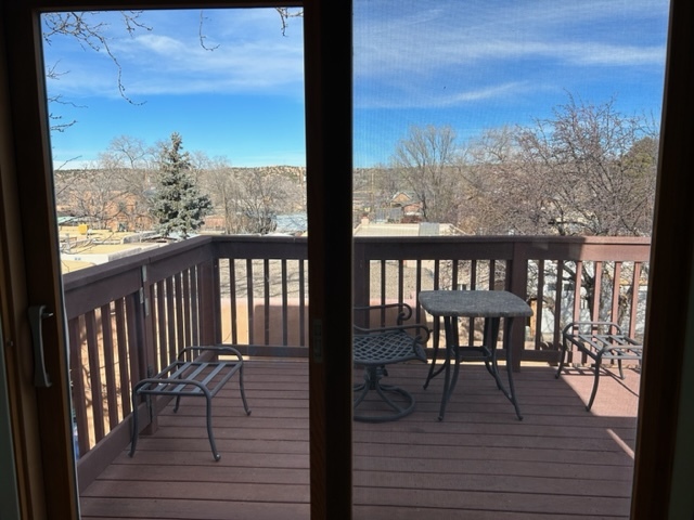 deck off upstairs room over backyard - 1007 Lopez St