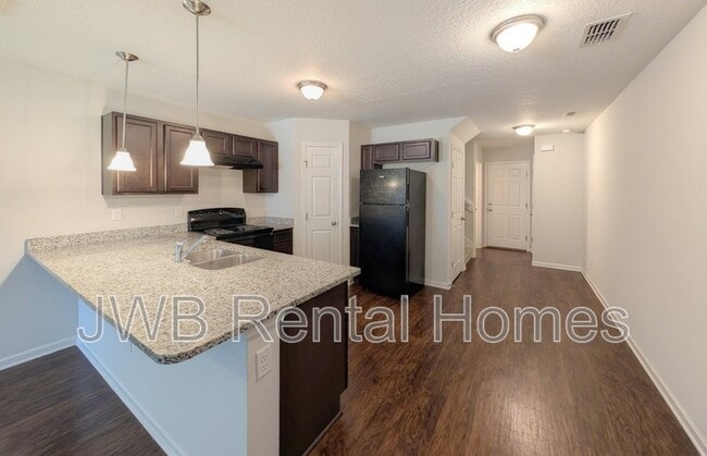 Building Photo - 8431 McGirts Village Ln
