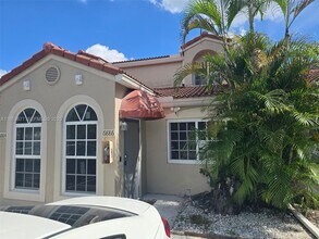 Building Photo - 6886 NW 166th Terrace