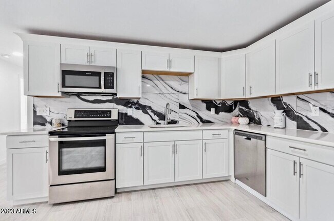 Building Photo - 7250 W Montecito Ave