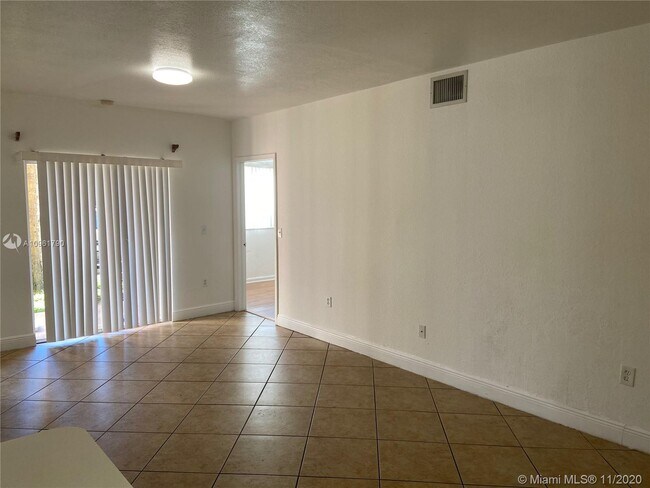 Building Photo - 3241 Sabal Palm Manor