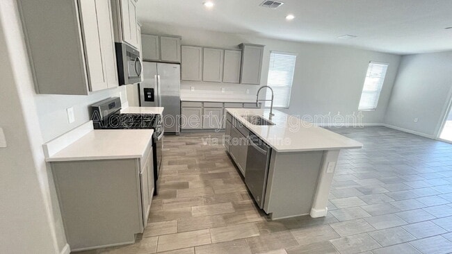 Building Photo - 37845 W Santa Barbara Ave