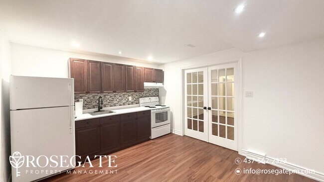 Photo du bâtiment - Brand New 1-Bedroom + Den Basement Unit in...