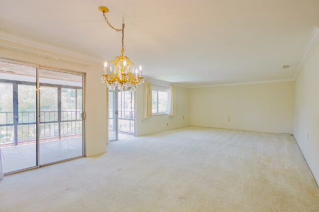 Building Photo - Spacious 3BD/3BA Condo with Enclosed Patio and Resort-style Amenities