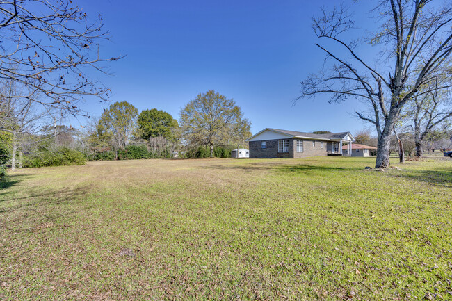 With the spaciousness of the property, there's so much room for children to run and play! - 1604 Edmondson Rd NE