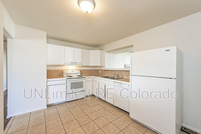 Building Photo - 5551 Tucson St