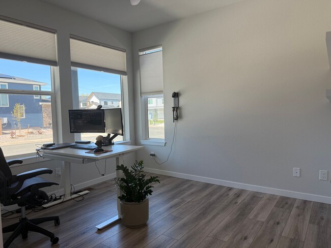 Building Photo - Stunning Luxury Living in Coal Creek with ...