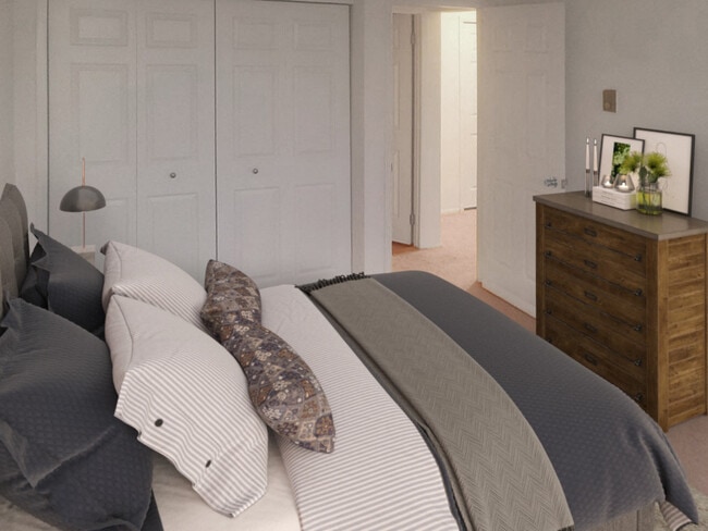 Dormitorio con diseño de onagra - Eastgate Woods Apartments
