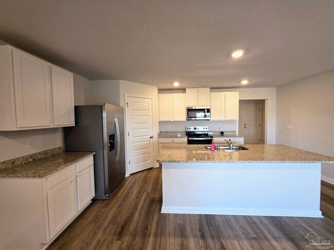 Foto del edificio - 5581 Silverbell Dr