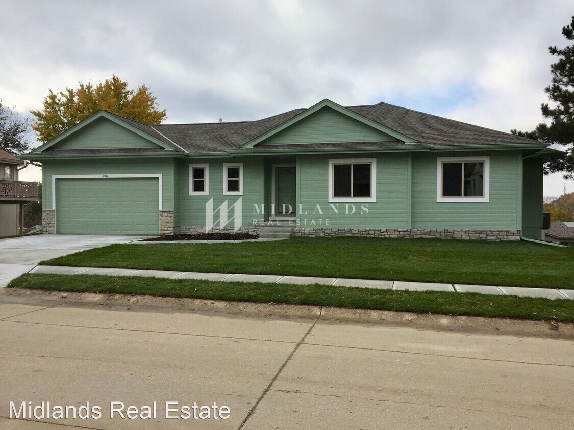 Foto principal - 3 br, 2 bath House - 6012 N 108TH AVE CIR