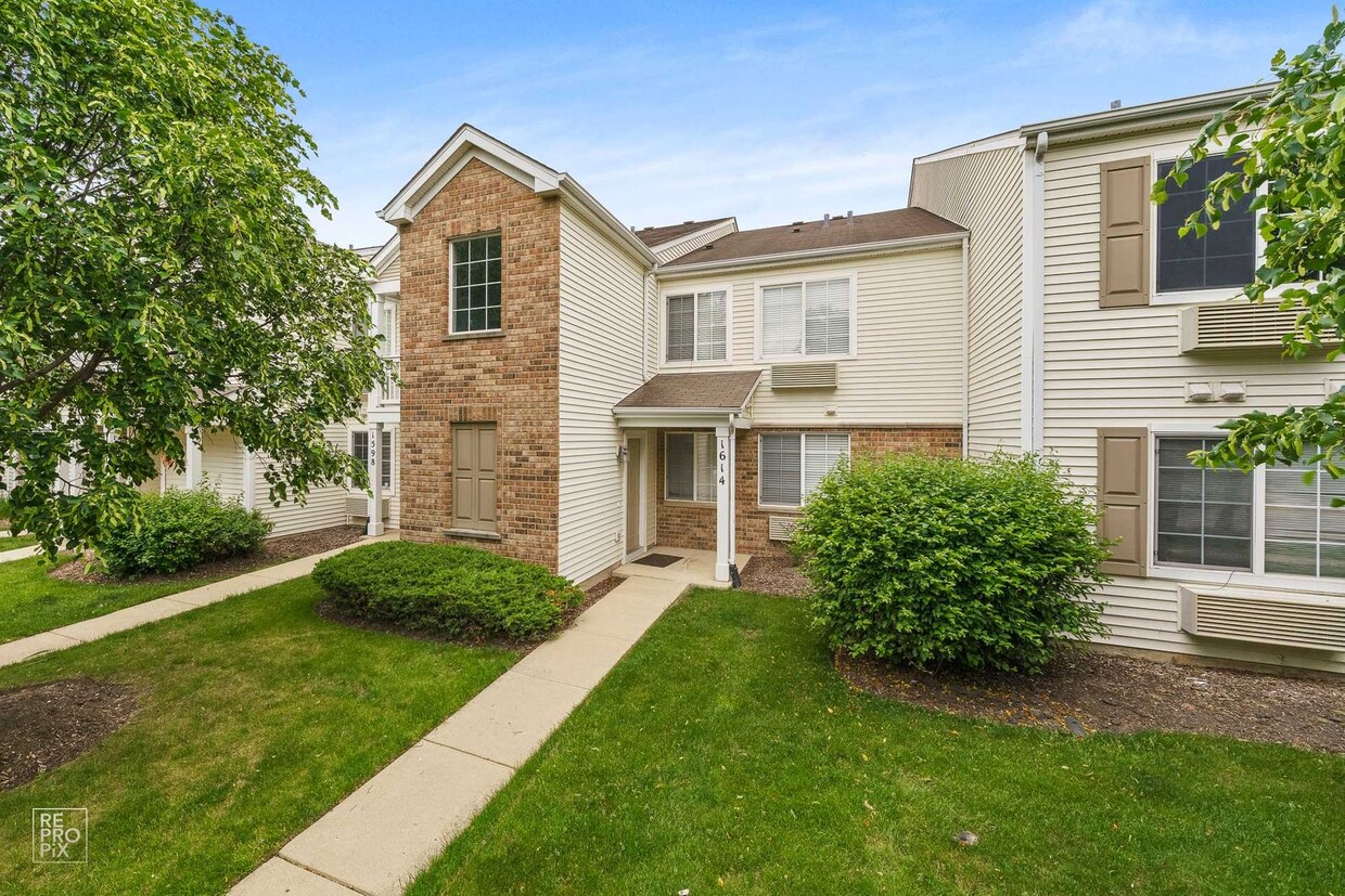 Primary Photo - Second Level Condo with Detached Garage