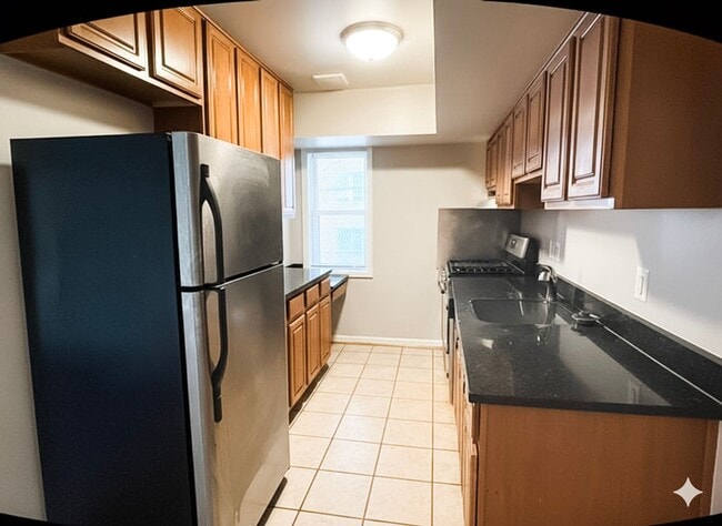 Building Photo - Spacious and Convenient 2-Bedroom Condo in...