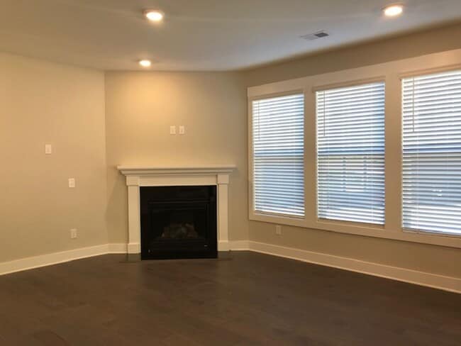 Building Photo - Brand New END UNIT North of Main St  3 mil...