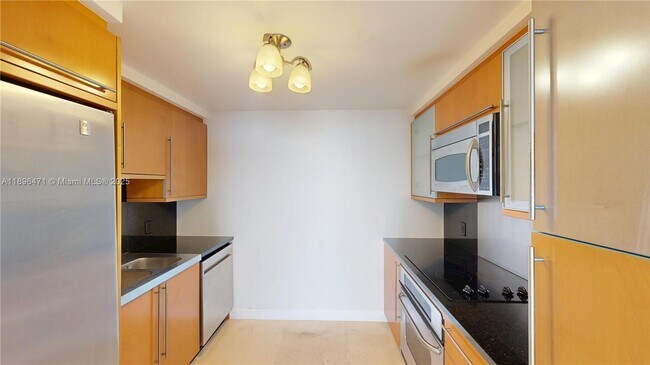 Building Photo - 6365 Collins Ave