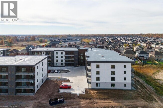 Building Photo - 7549B KALAR Road Unit# 405