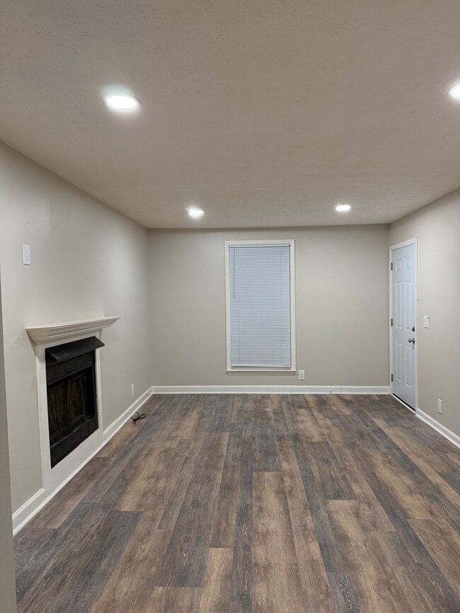 18x12 living room, gas fireplace, new recess lighting and freshly painted, new front doors! - 111 Cash Ln