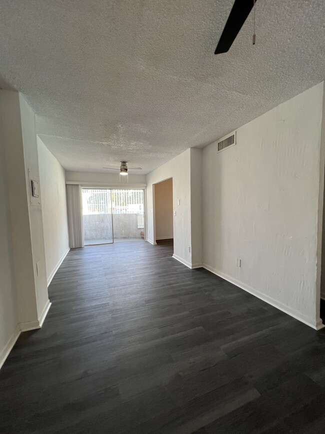 Living room and dining area - 7801 NE 4th Ct