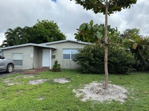 Building Photo - 830 NE 58th Ct