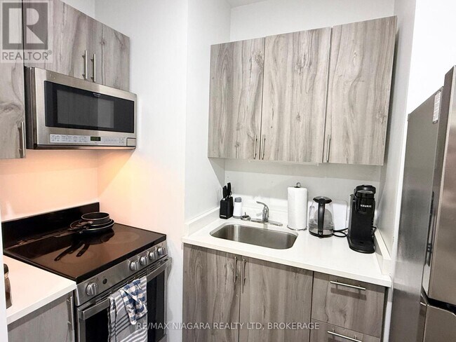 Photo du bâtiment - 4701 River Rd