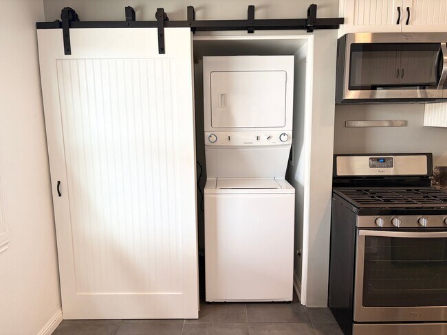 Building Photo - Beautifully Maintained 4-Bedroom Home with Private Backyard