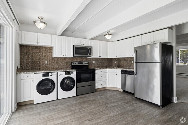 2 habitaciones, 1.5 baños - 950 pies cuadrados - Cocina - Universe at Mariners Cove