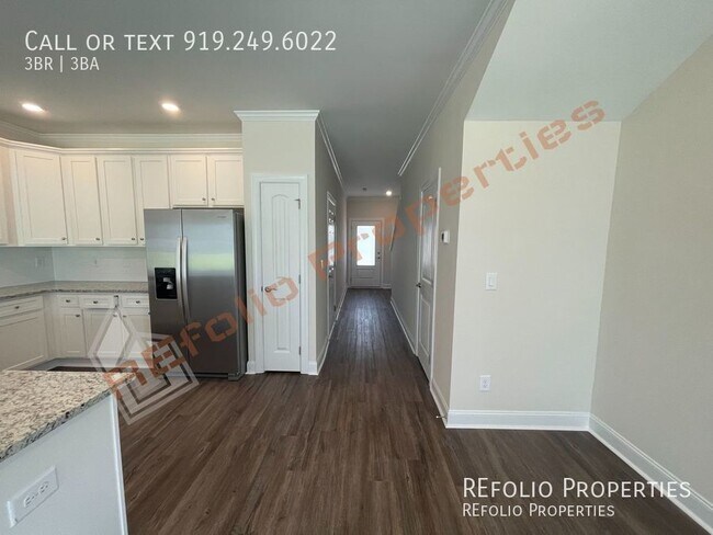 Building Photo - Brand New 3 Bedroom 1-Car Garage End Unit ...