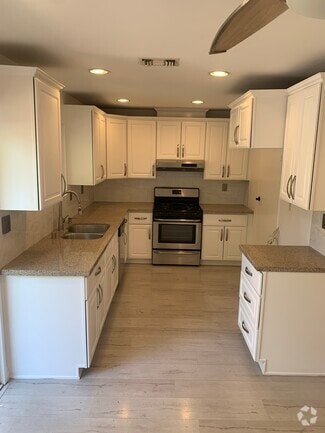 Building Photo - 7560 Corbin Ave