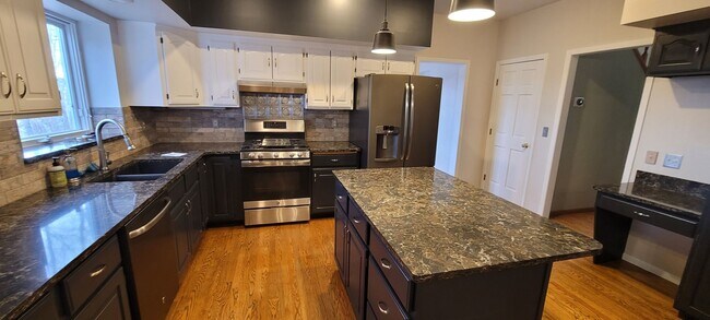 Building Photo - Beautiful Home Down by the River