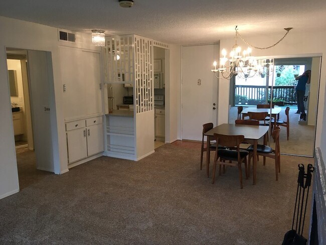 Dining/living room area opens to balcony - 5316 Raintree Cir