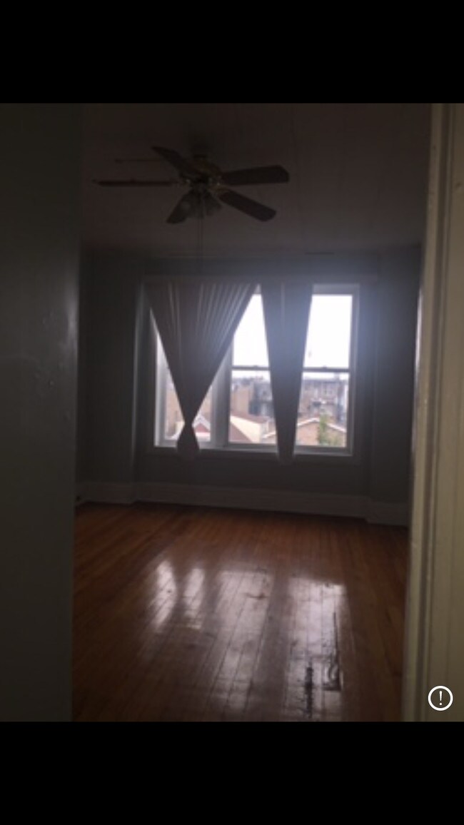 Living room. - 2140 W 21st Pl