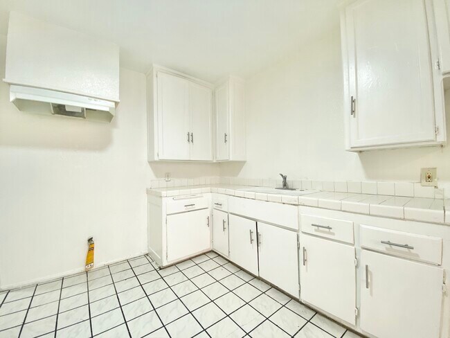 Building Photo - 6337 10th Ave