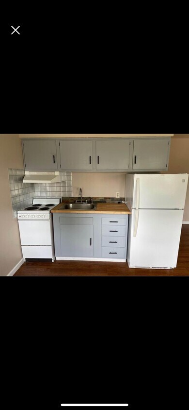 Update kitchen with new countertops - 300 Main St