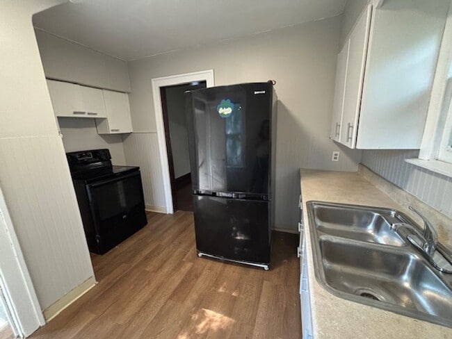 Building Photo - Classic 1928 Goodyear Heights charmer—fire...