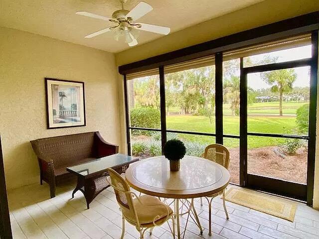 Building Photo - 7032 Pelican Bay Boulevard, Unit 103