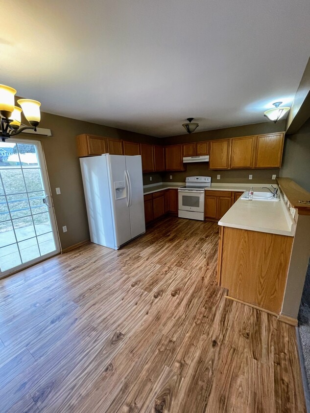 Spacious kitchen with lots of storage, dishwasher, garbage disposal, and natural sunlight - 2216 Patrick Ln