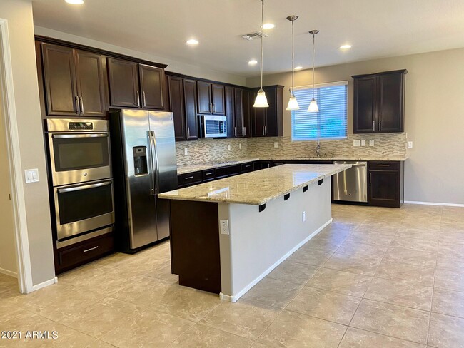 Building Photo - 7912 W Quail Track Dr