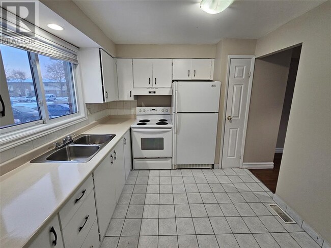 Building Photo - 215 Trudeau Dr