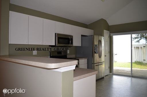 Building Photo - 8717 Persea Ct