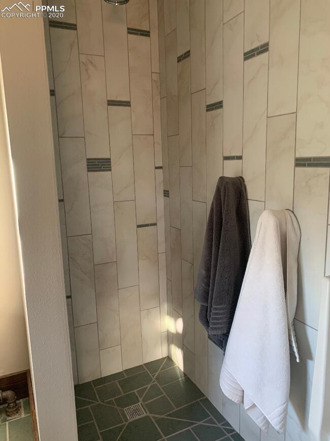 shower in downstairs bathroom/laundry room - 119 Cheyenne Blvd