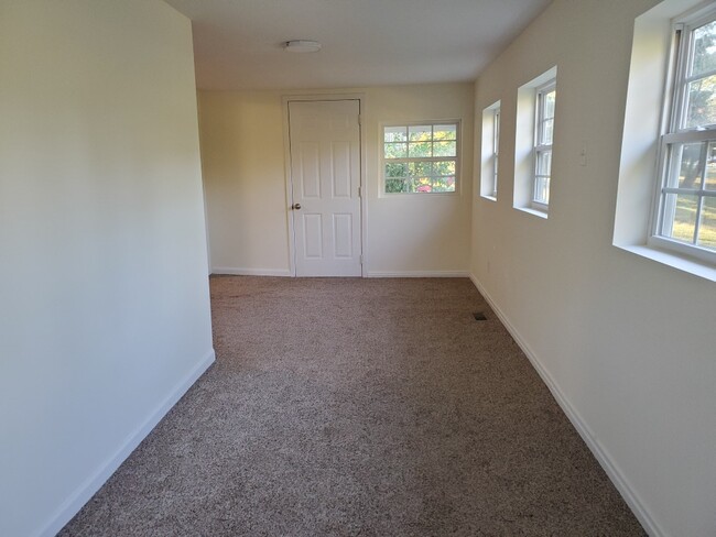 Back room/Bed room facing side door - 25 Maple St