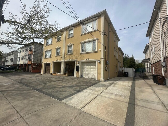 Building Photo - 15-60-60 209th St