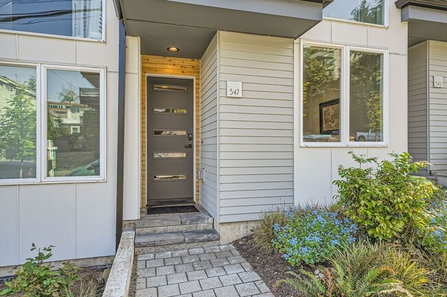 Photo - Modern stylings and cutting-edge convenien... House