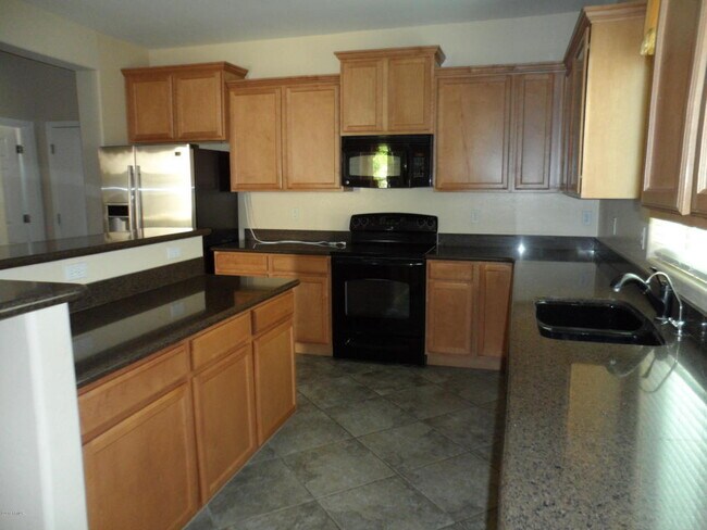 Building Photo - 9184 W Meadow Dr