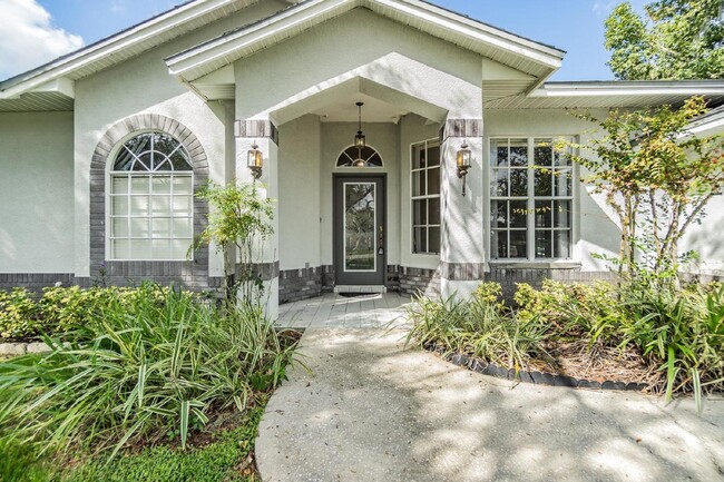 Building Photo - "Discover Spacious Elegance: 4-Bedroom Ret...