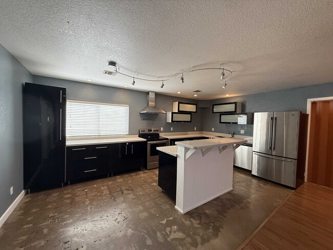 Foto del edificio - 3035 W 11th Ln